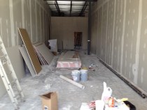 Photo of interior construction going on at our soon-to-come second location